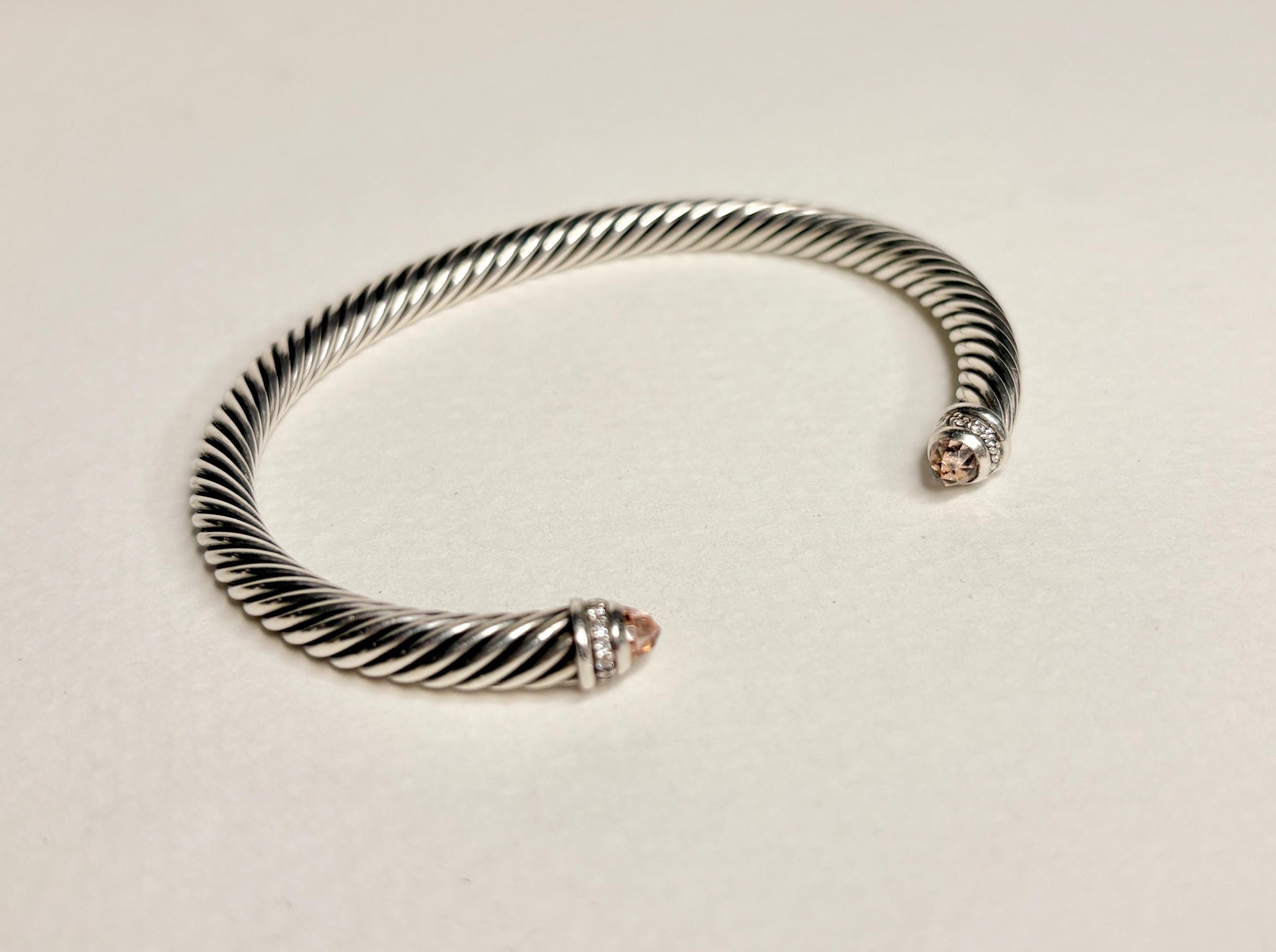 Sterling silver cable cuff bracelet with morganite and diamond accents.