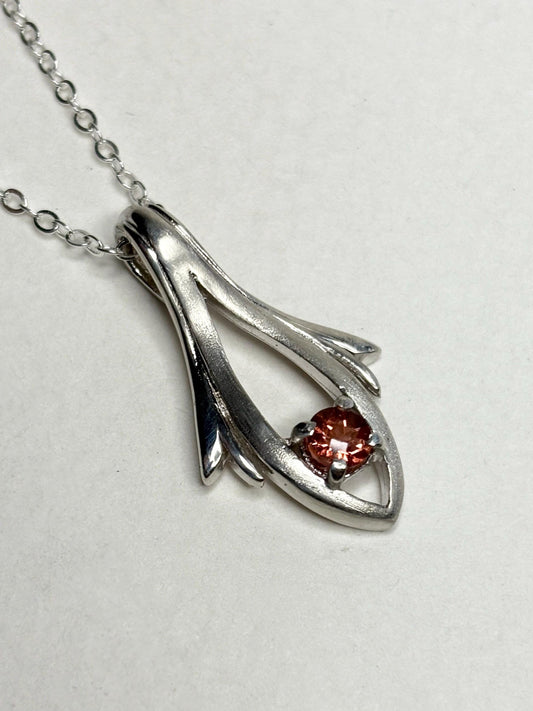 Sterling silver pendant necklace with a light red Oregon sunstone.