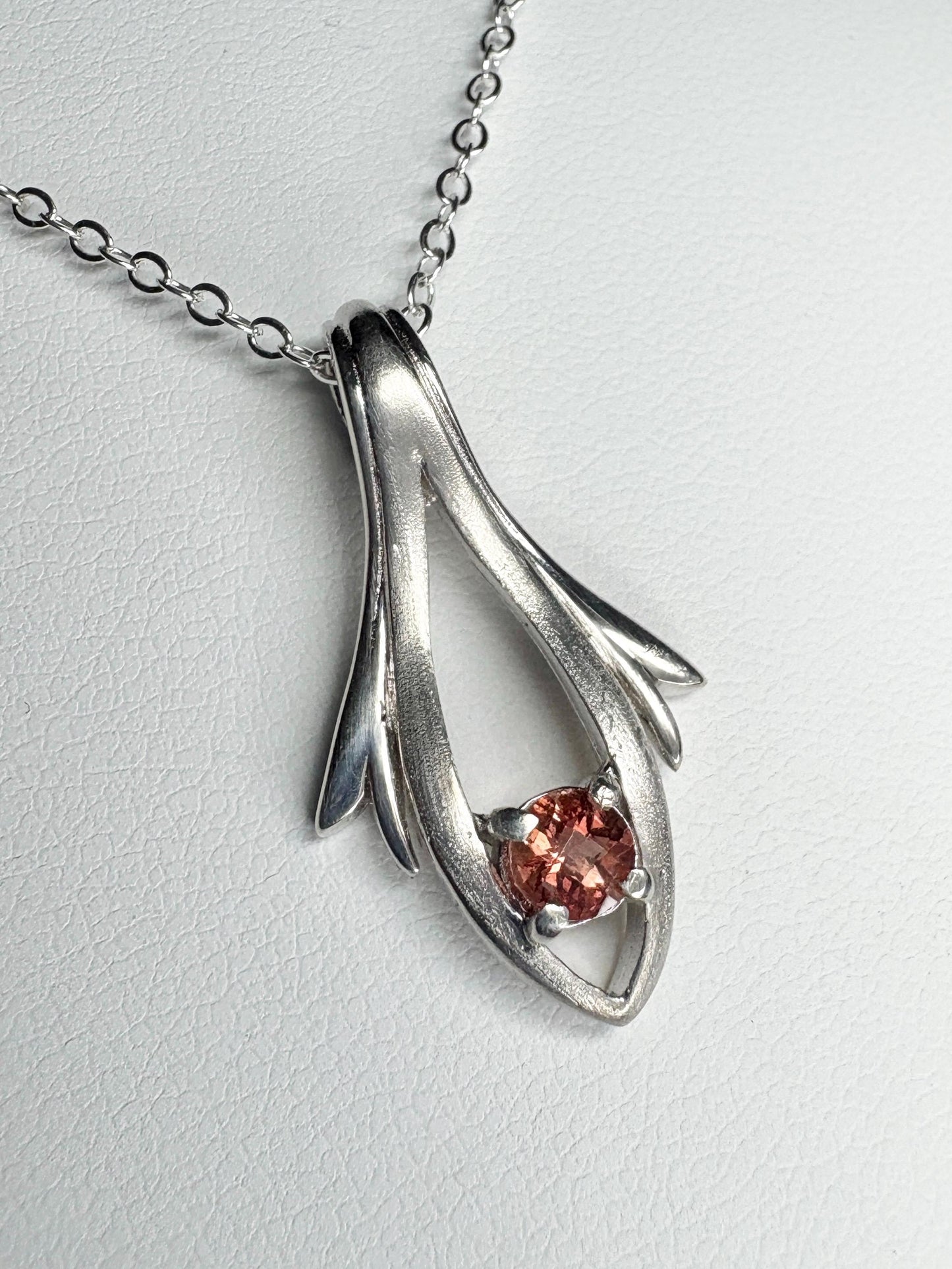 Sterling silver pendant necklace with a light red Oregon sunstone.