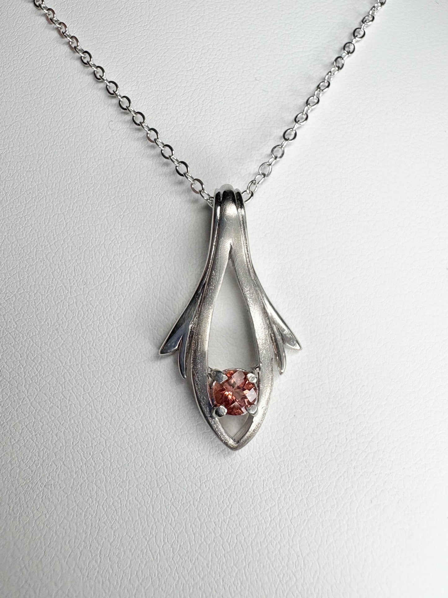 Sterling silver pendant necklace with a light red Oregon sunstone.