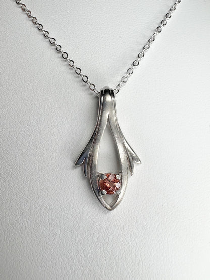 Sterling silver pendant necklace with a light red Oregon sunstone.