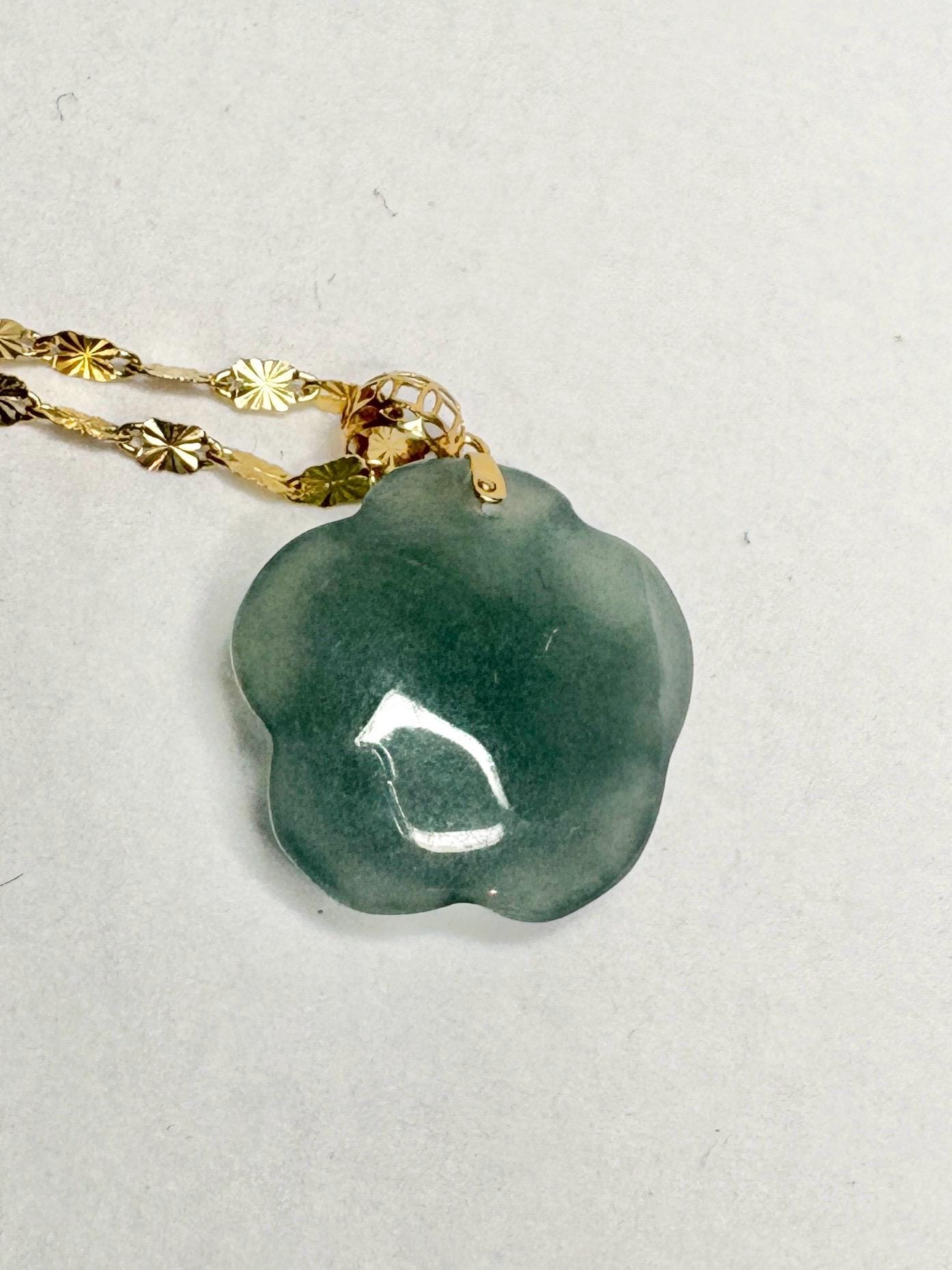 Teal jadeite rose pendant necklace on a 14k gold chain.