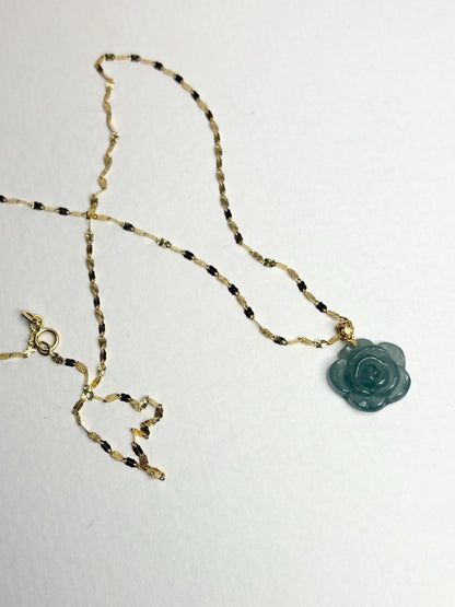 Teal jadeite jade rose pendant on a delicate 14k gold chain.