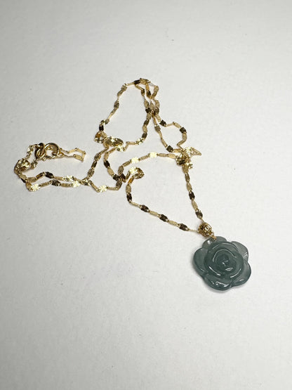 Teal jadeite jade rose pendant on a delicate 14k gold chain.