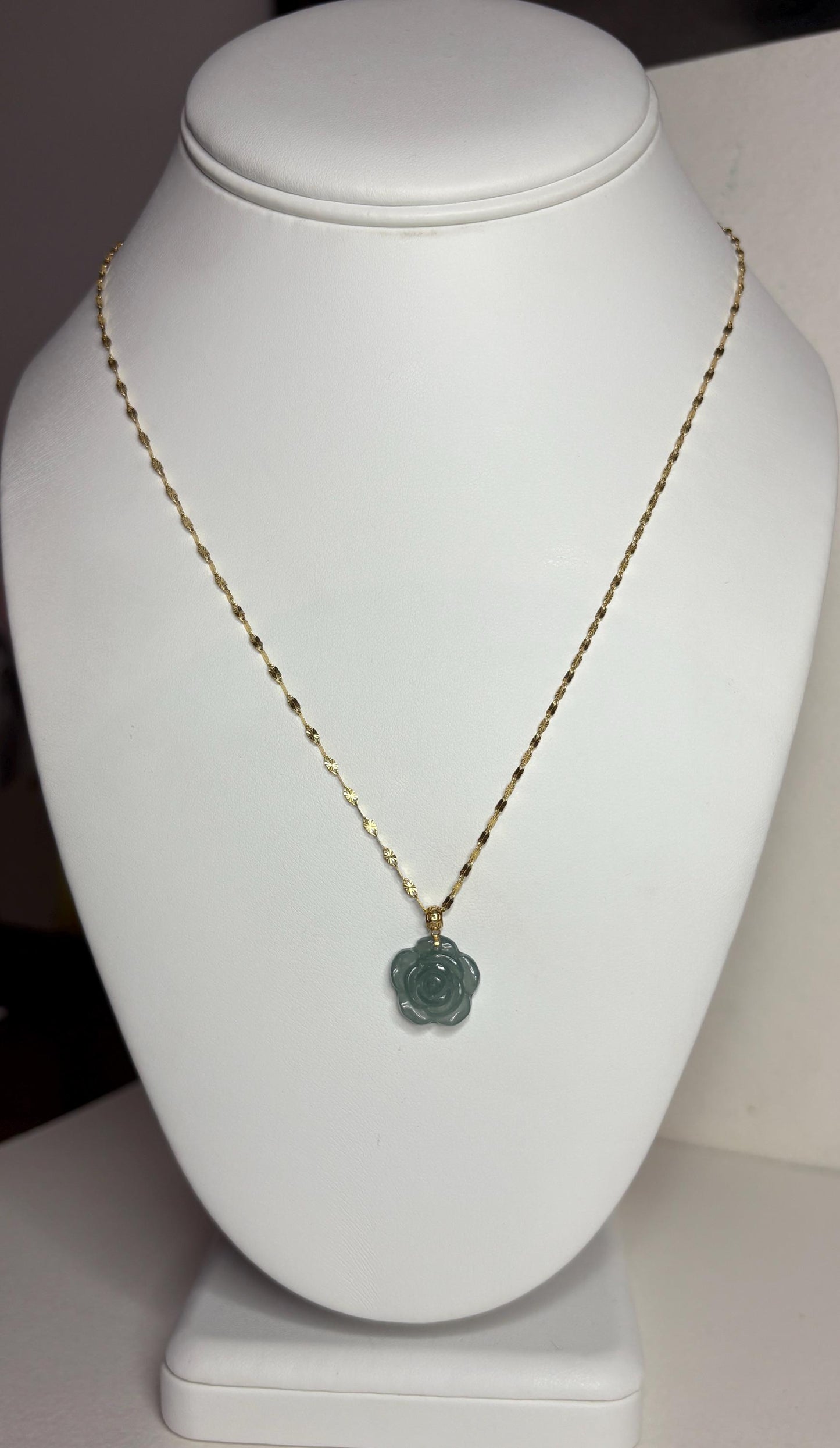 Teal jadeite rose pendant necklace on a 14k gold chain.