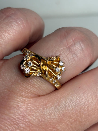 Solid 21k gold bypass ring with white stones, size 8.5.