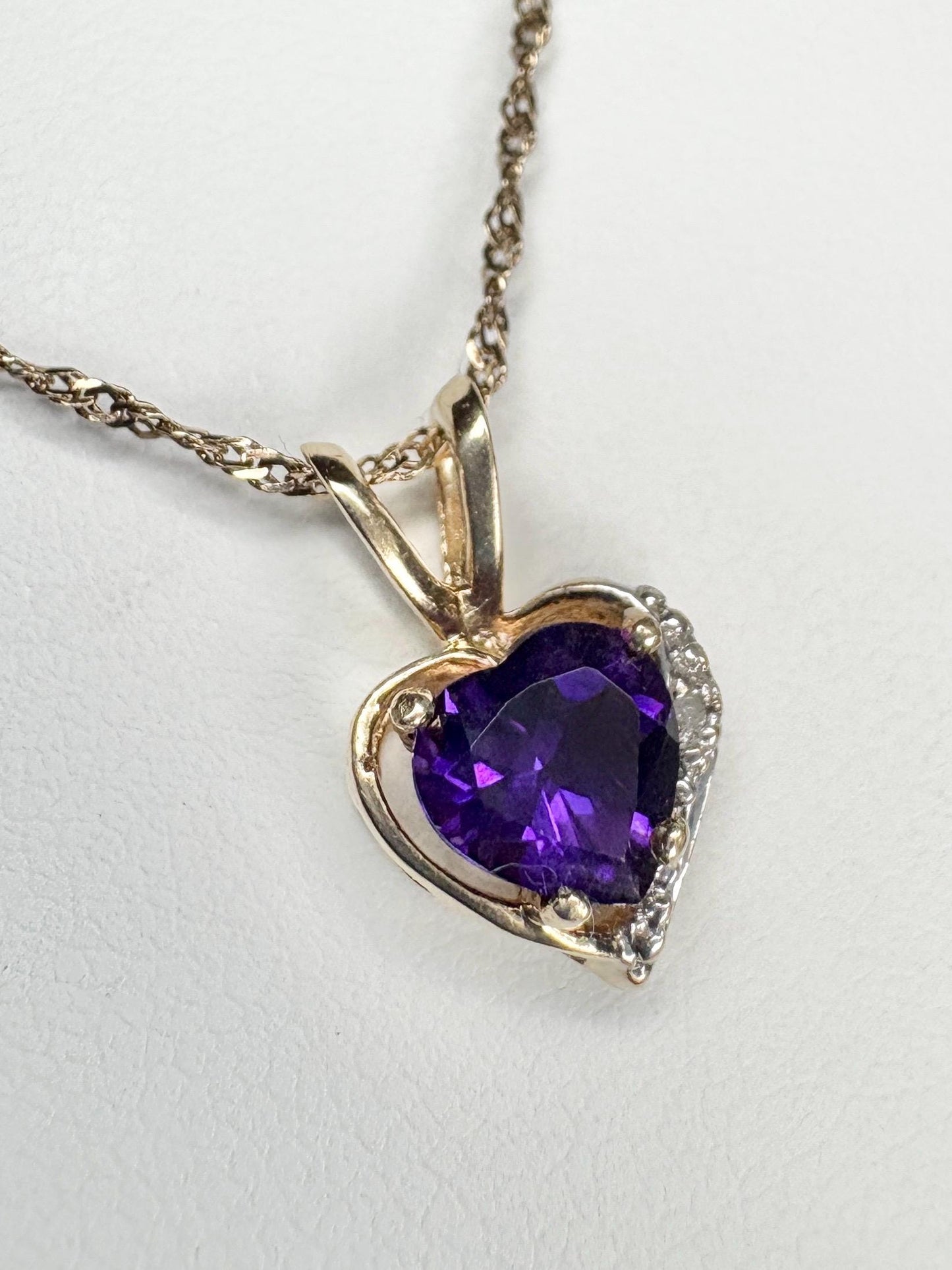 14k gold heart pendant with African amethyst and diamond on a 14k gold chain.