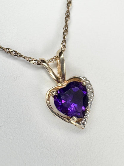 14k gold heart pendant with African amethyst and diamond on a 14k gold chain.