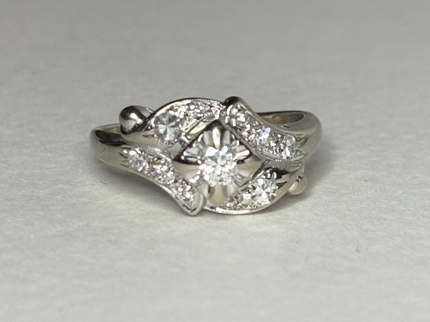 Vintage 14k white gold ring with natural diamonds.