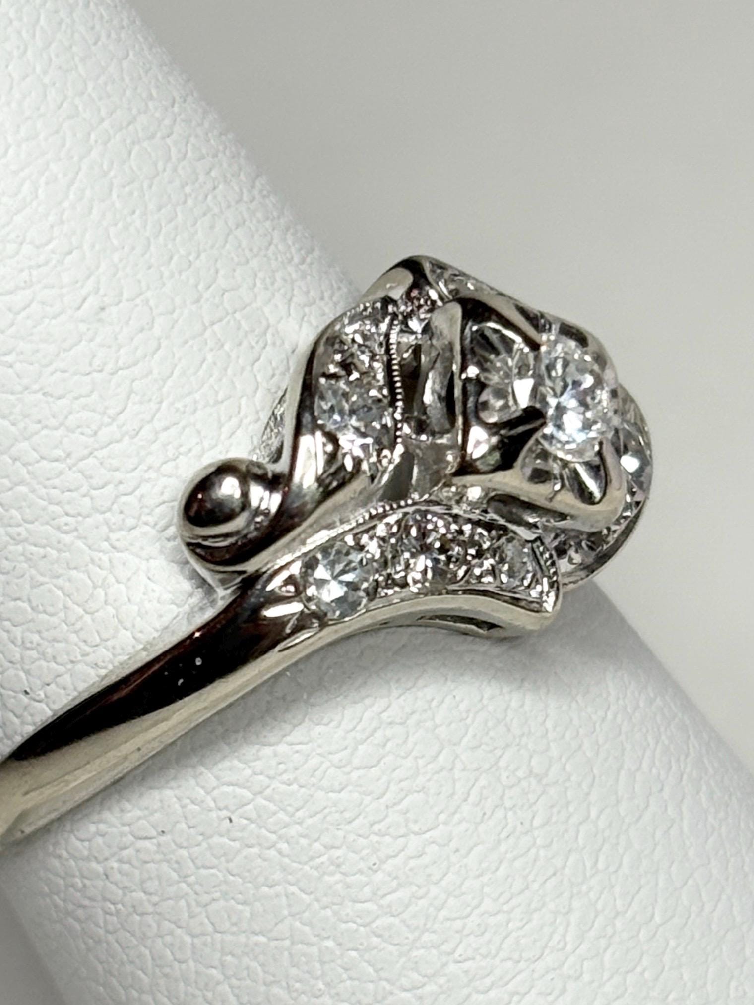 Vintage 14k white gold ring with natural diamonds.
