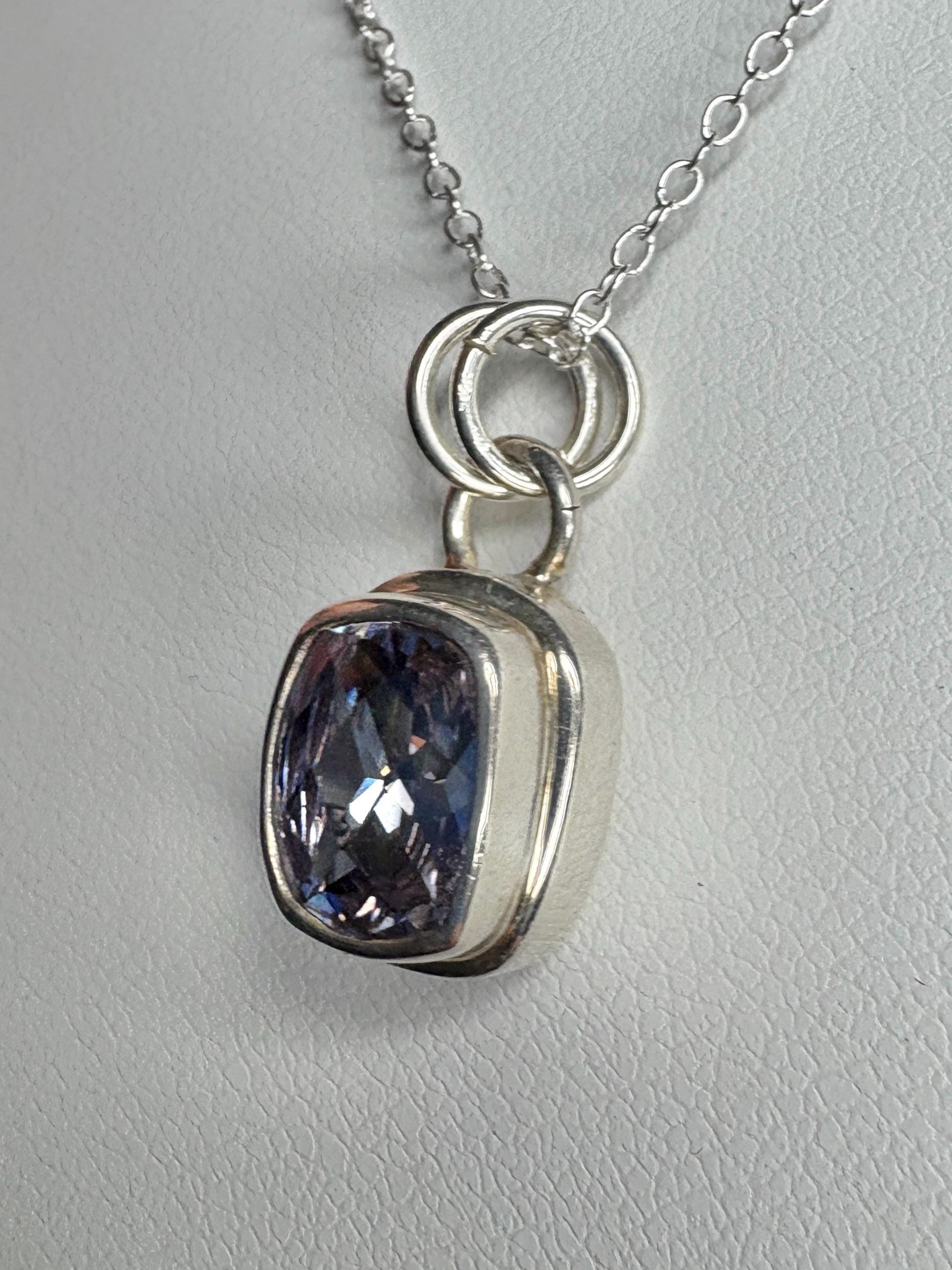 Sterling silver pendant necklace with a lavender checkerboard faceted cushion-cut CZ.