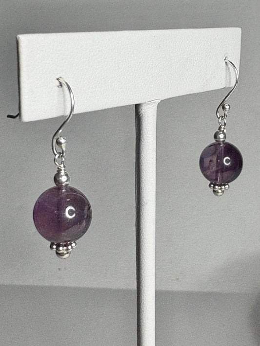 Sterling silver dangle earrings with 10mm natural amethyst beads.