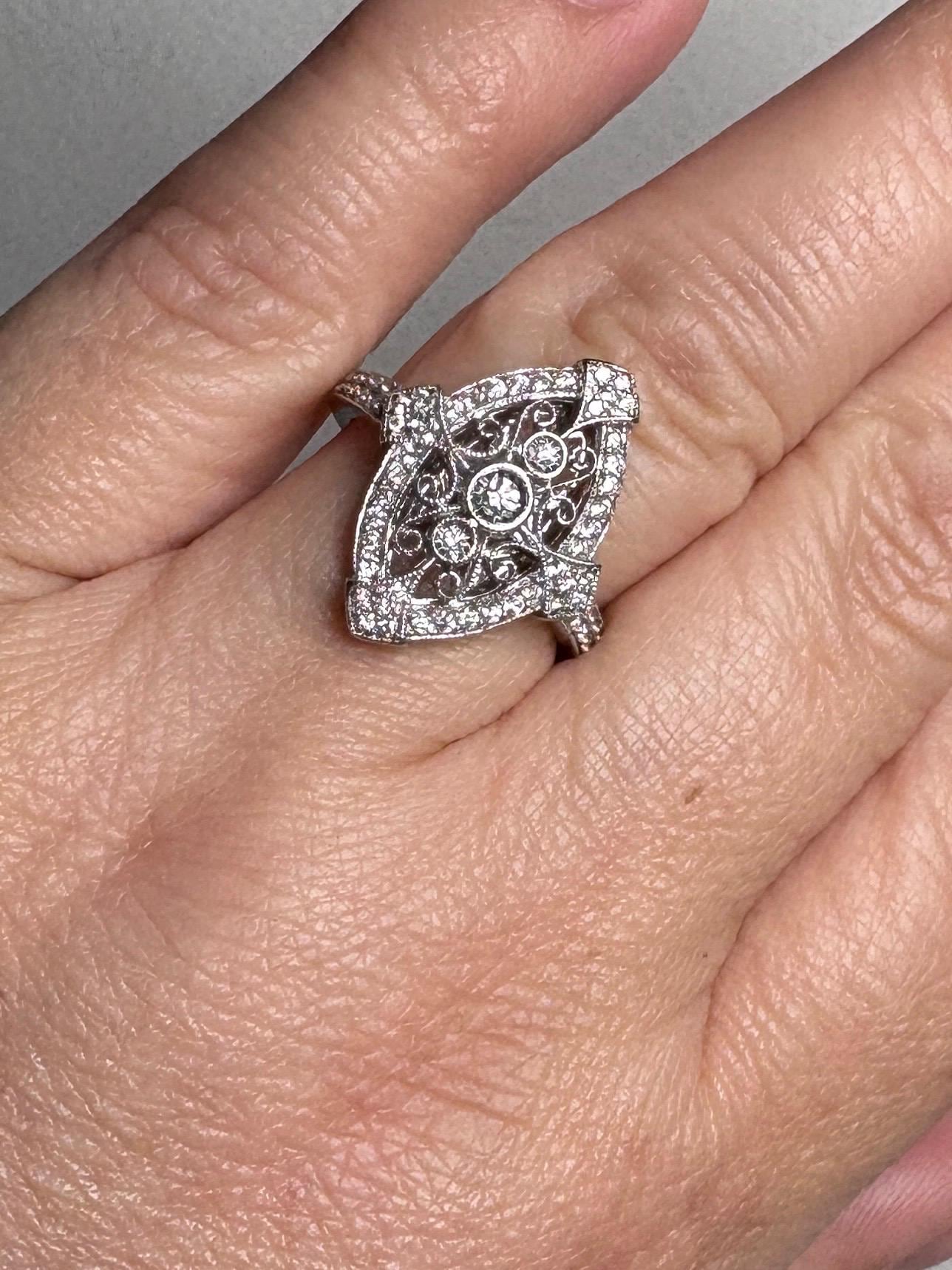 Art Deco revival navette diamond ring in 14k white gold.