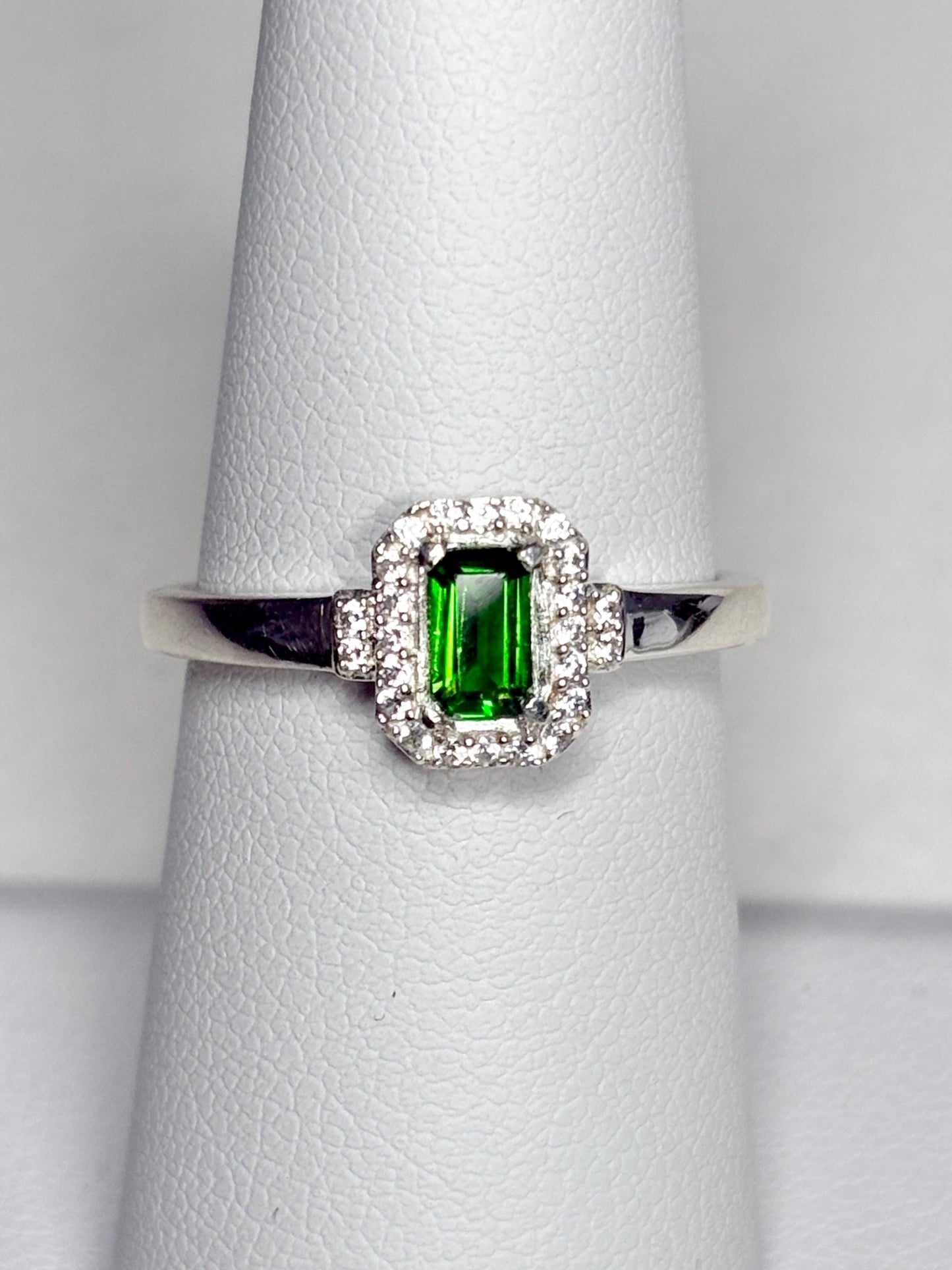 Sterling silver ring with emerald-cut chrome diopside and white zircon halo.