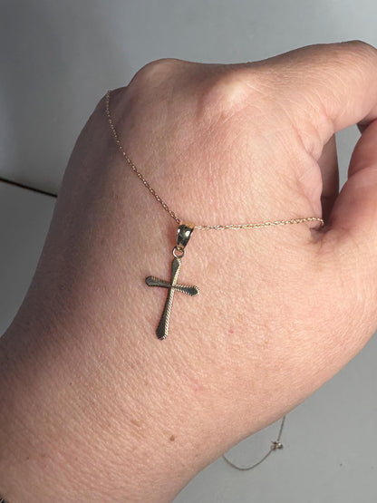 Solid 10k gold cross pendant necklace on a 19-inch rope chain.