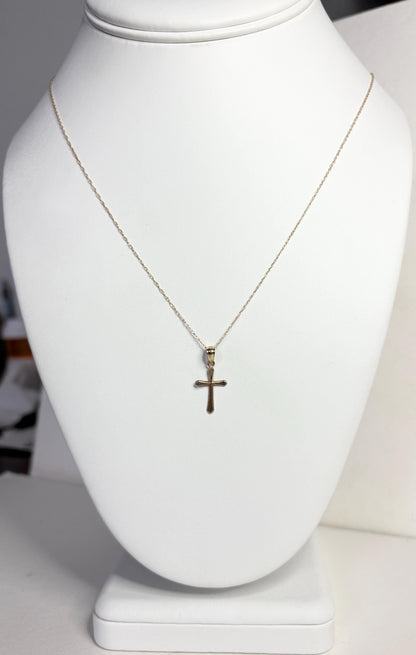 Solid 10k gold cross pendant on a 19-inch rope chain.