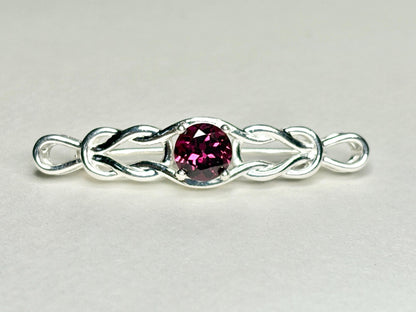 Rhodolite garnet Celtic knot bar brooch in solid sterling silver.