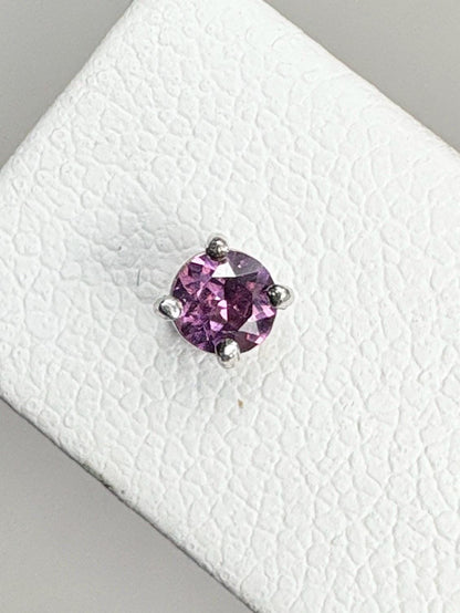 Round rhodolite garnet stud earrings in 14k white gold.