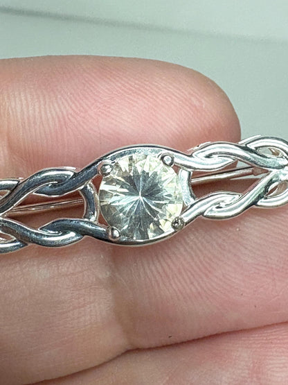 Yellow Oregon sunstone brooch with Celtic knot design in sterling silver.