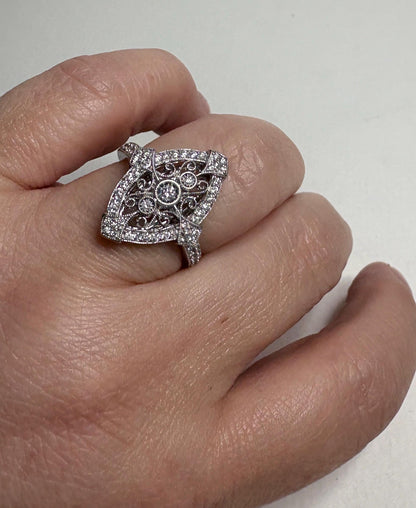 Art Deco revival navette ring in 14k white gold with diamonds.