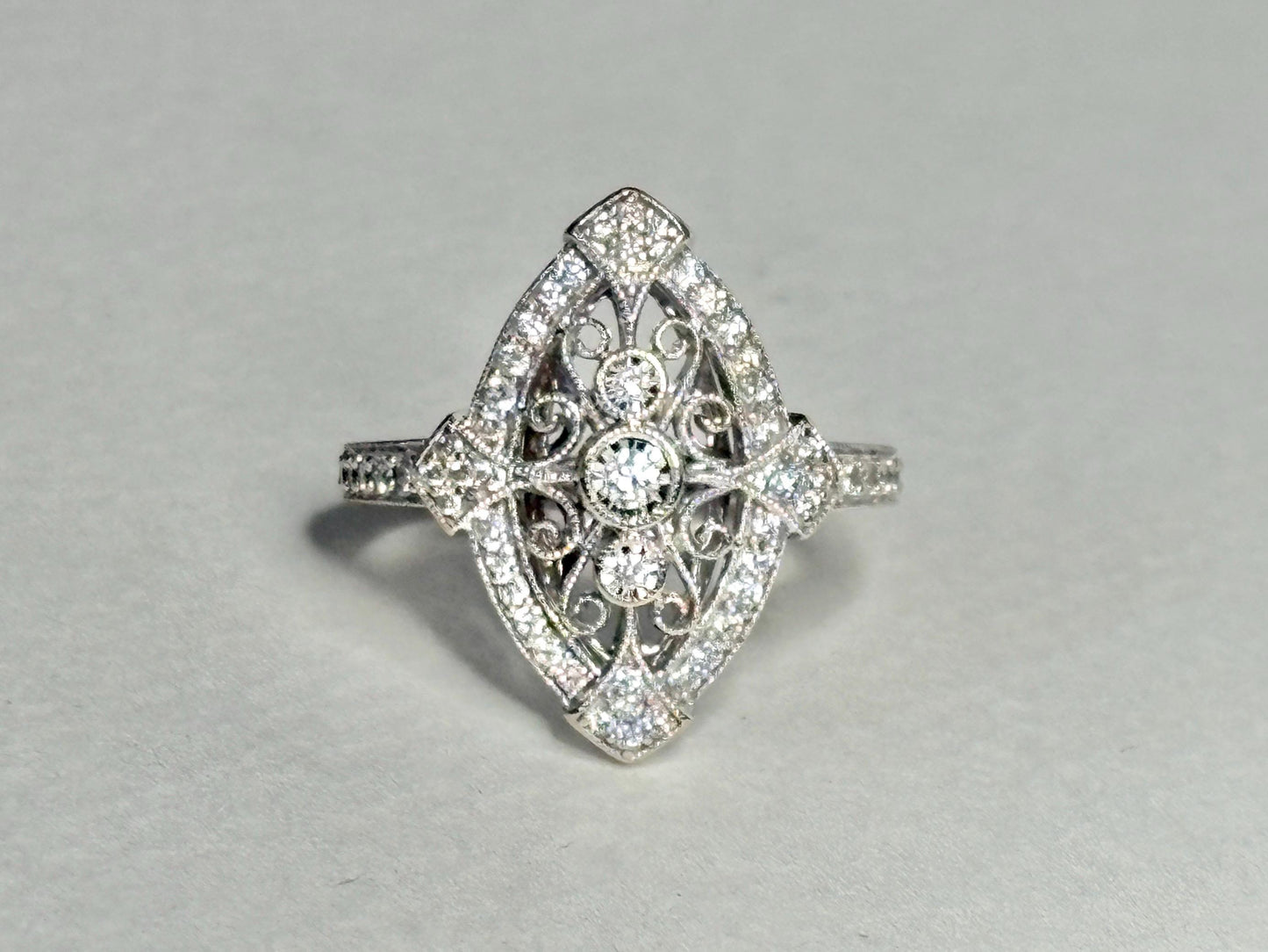 Art Deco revival navette ring in 14k white gold with diamonds.