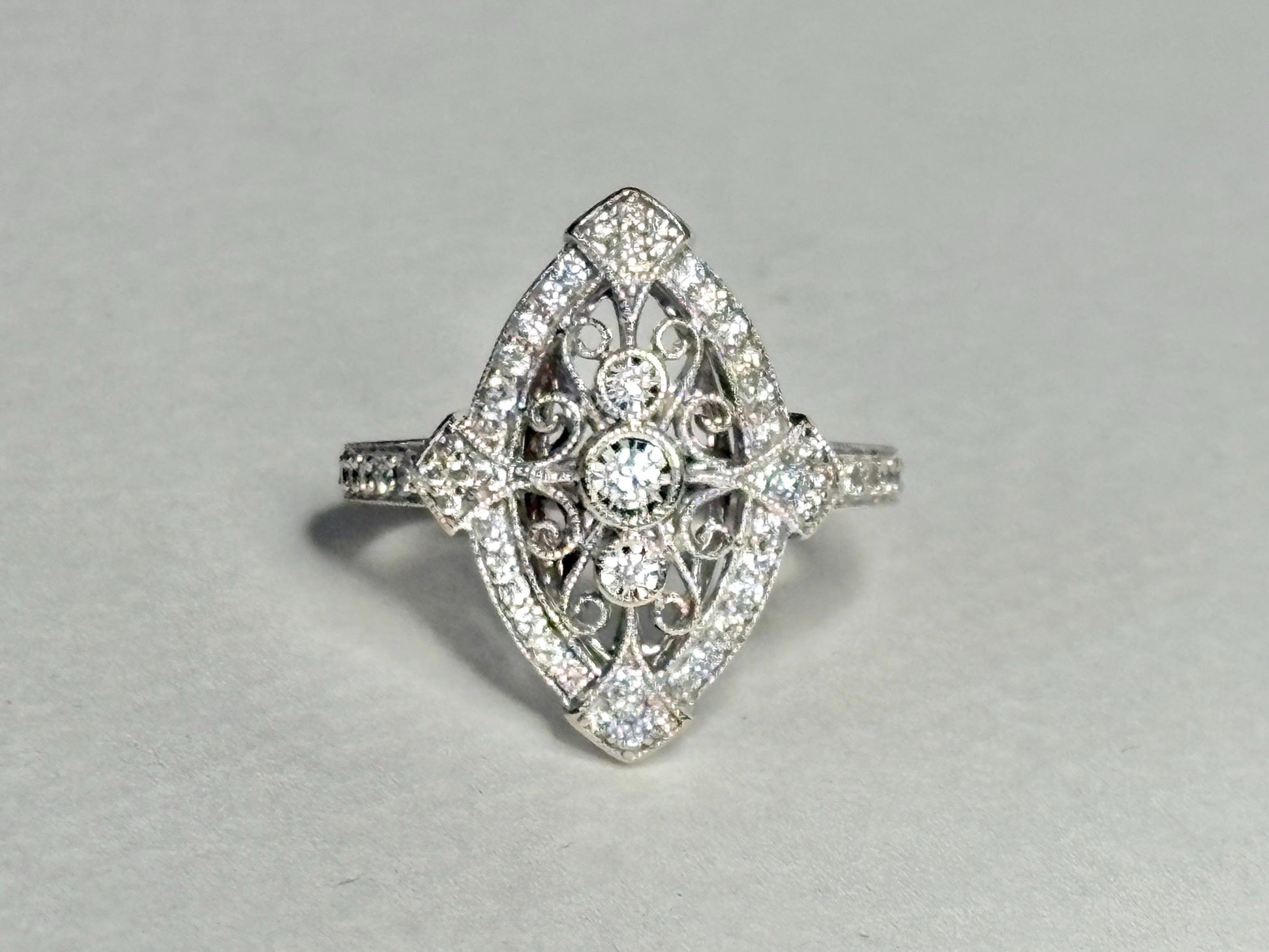 Art Deco revival navette ring in 14k white gold with diamonds.