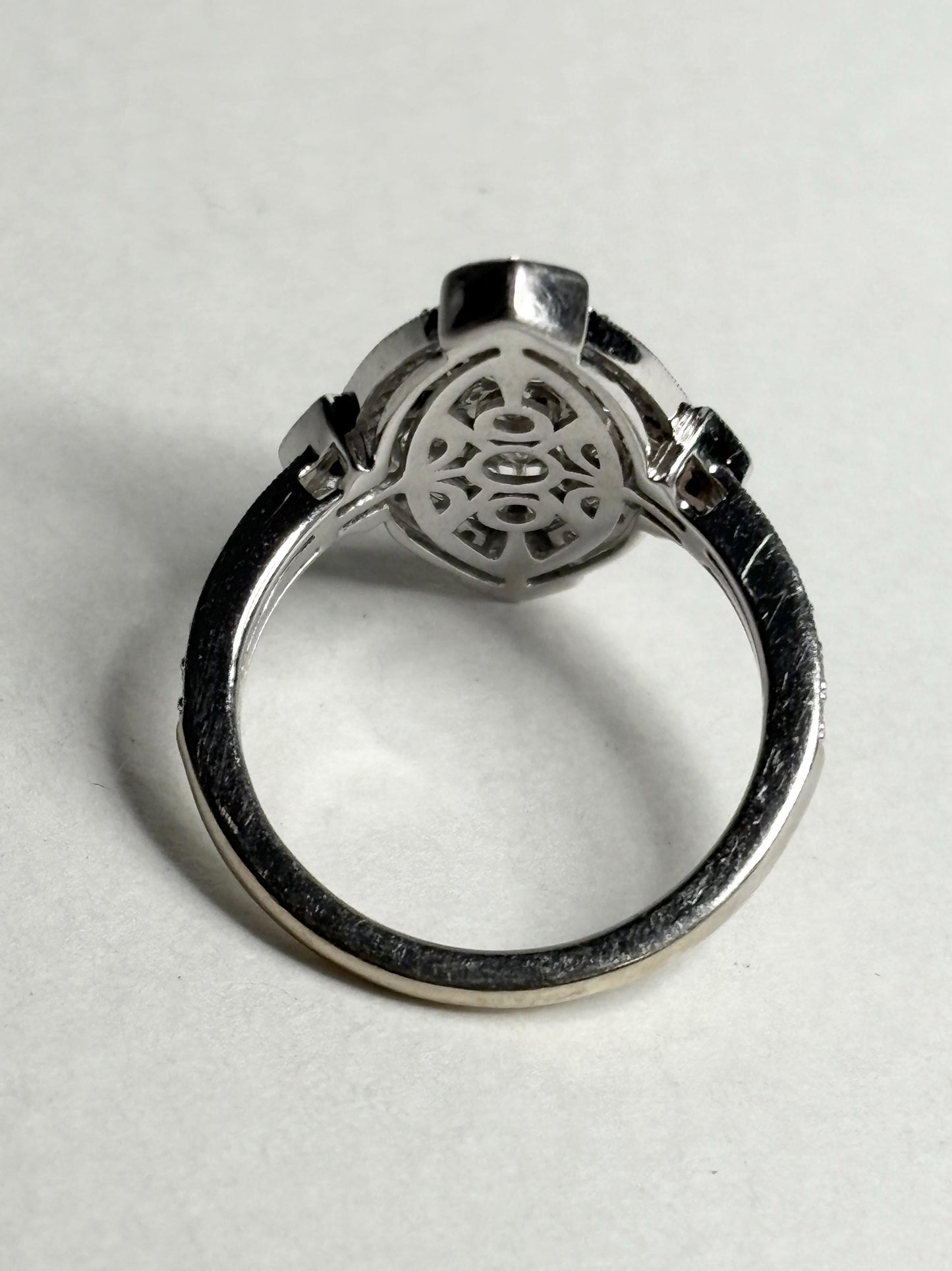 Art Deco revival white gold ring with navette diamond setting.