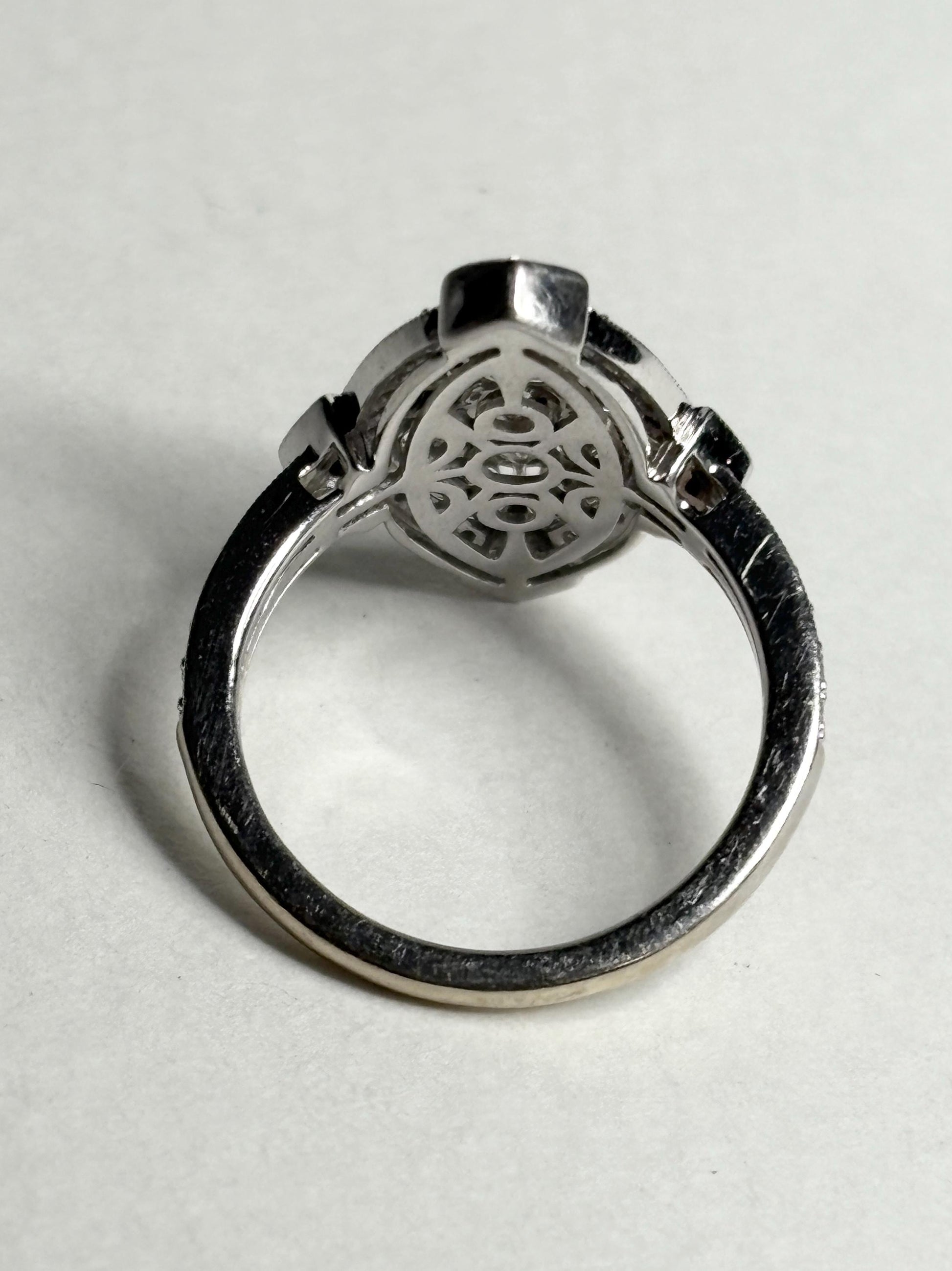 Art Deco revival white gold ring with navette diamond setting.