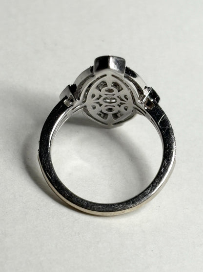 Art Deco revival white gold ring with navette diamond setting.