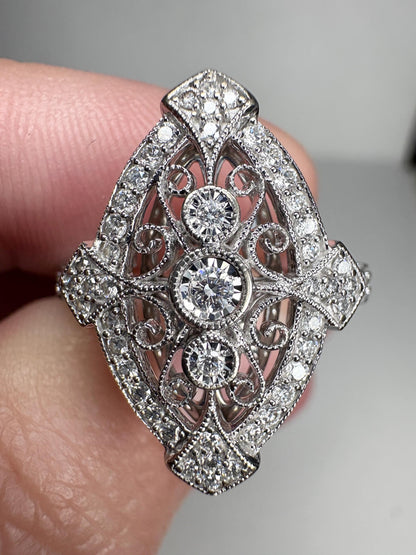 Art Deco revival navette ring in 14k white gold with diamonds.