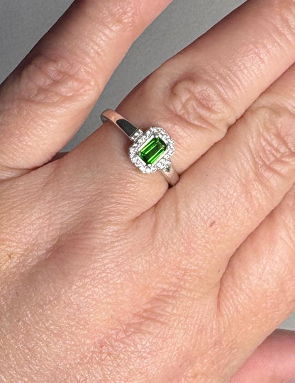 Sterling silver ring with emerald-cut chrome diopside and zircon halo.