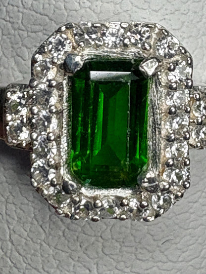 Sterling silver ring with emerald-cut chrome diopside and zircon halo.