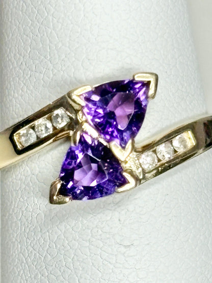 Amethyst trillion bypass ring with diamonds in 10k gold.
