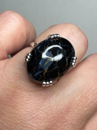Sterling silver ring with a large oval Arizona pietersite gemstone.
