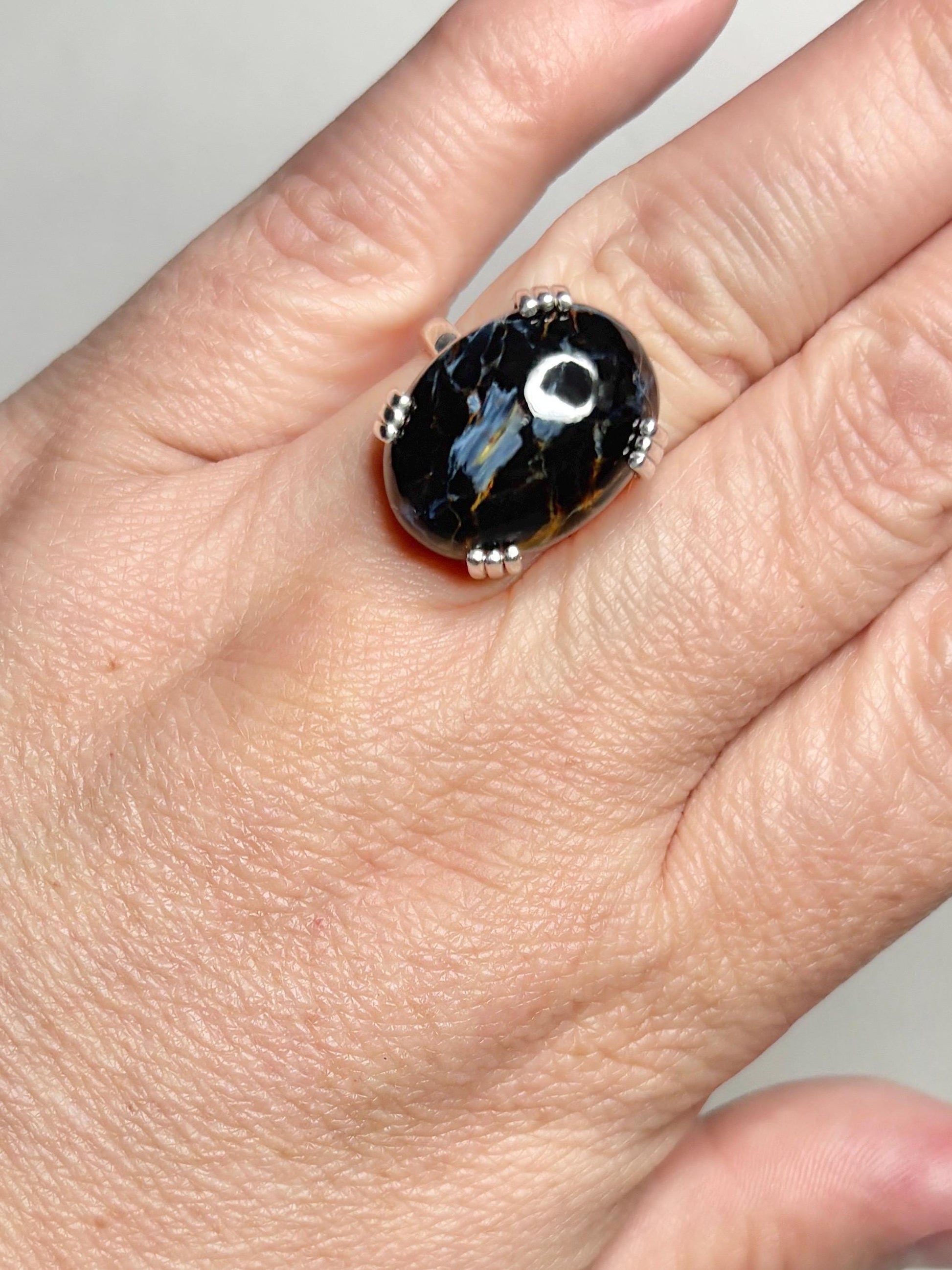 Sterling silver ring with an oval Arizona Pietersite stone.