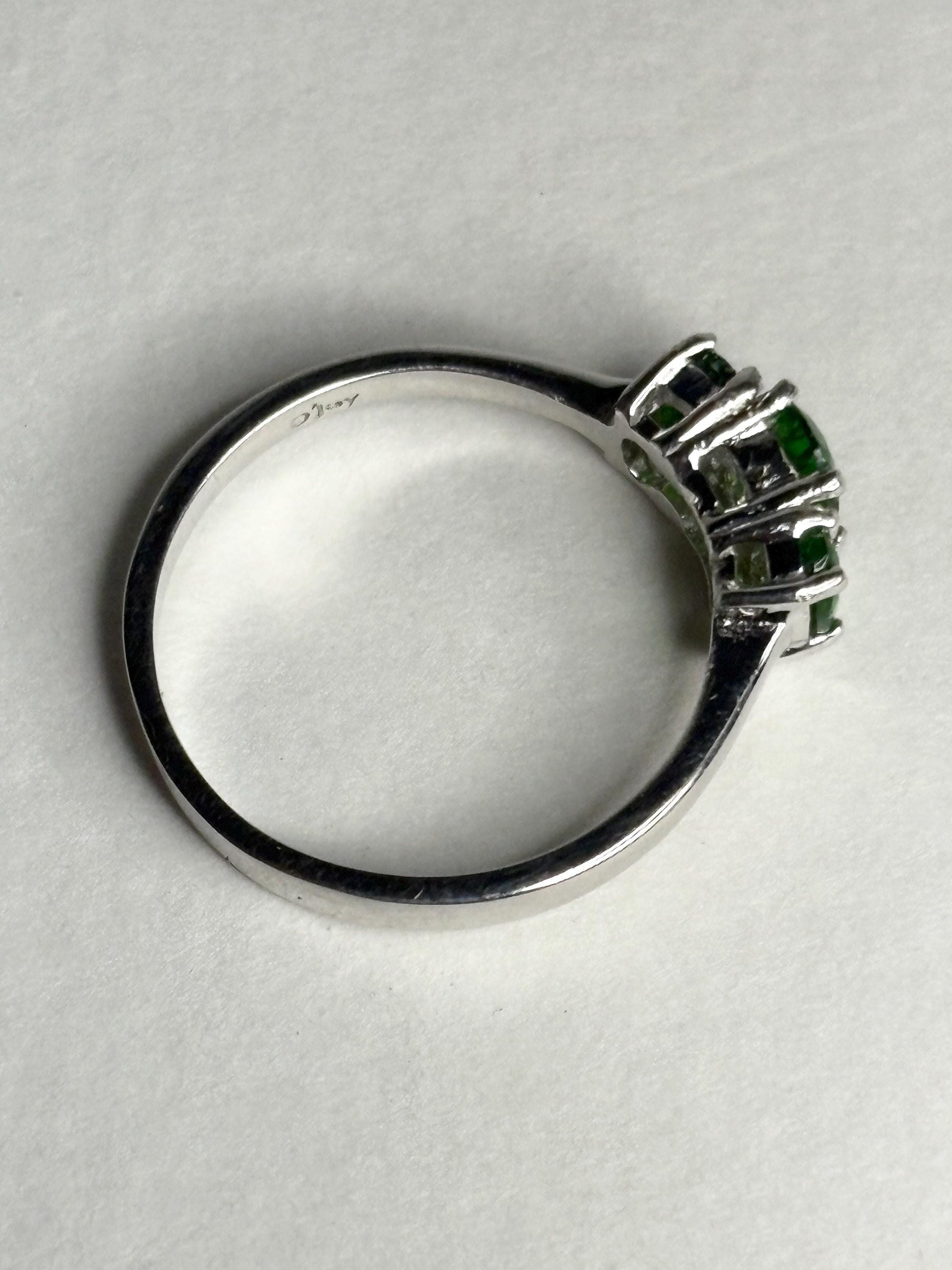 Sterling silver ring with three green chrome diopside stones.