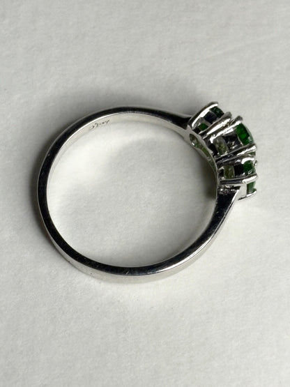 Sterling silver ring with three green chrome diopside stones.