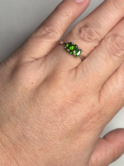 Sterling silver ring with three oval chrome diopside stones.
