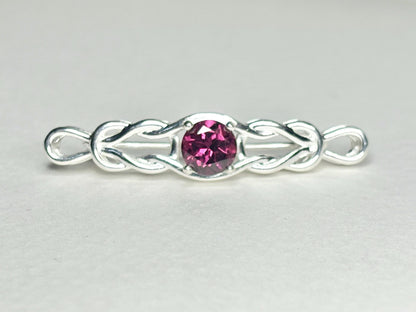 Rhodolite garnet Celtic knot bar brooch in sterling silver.