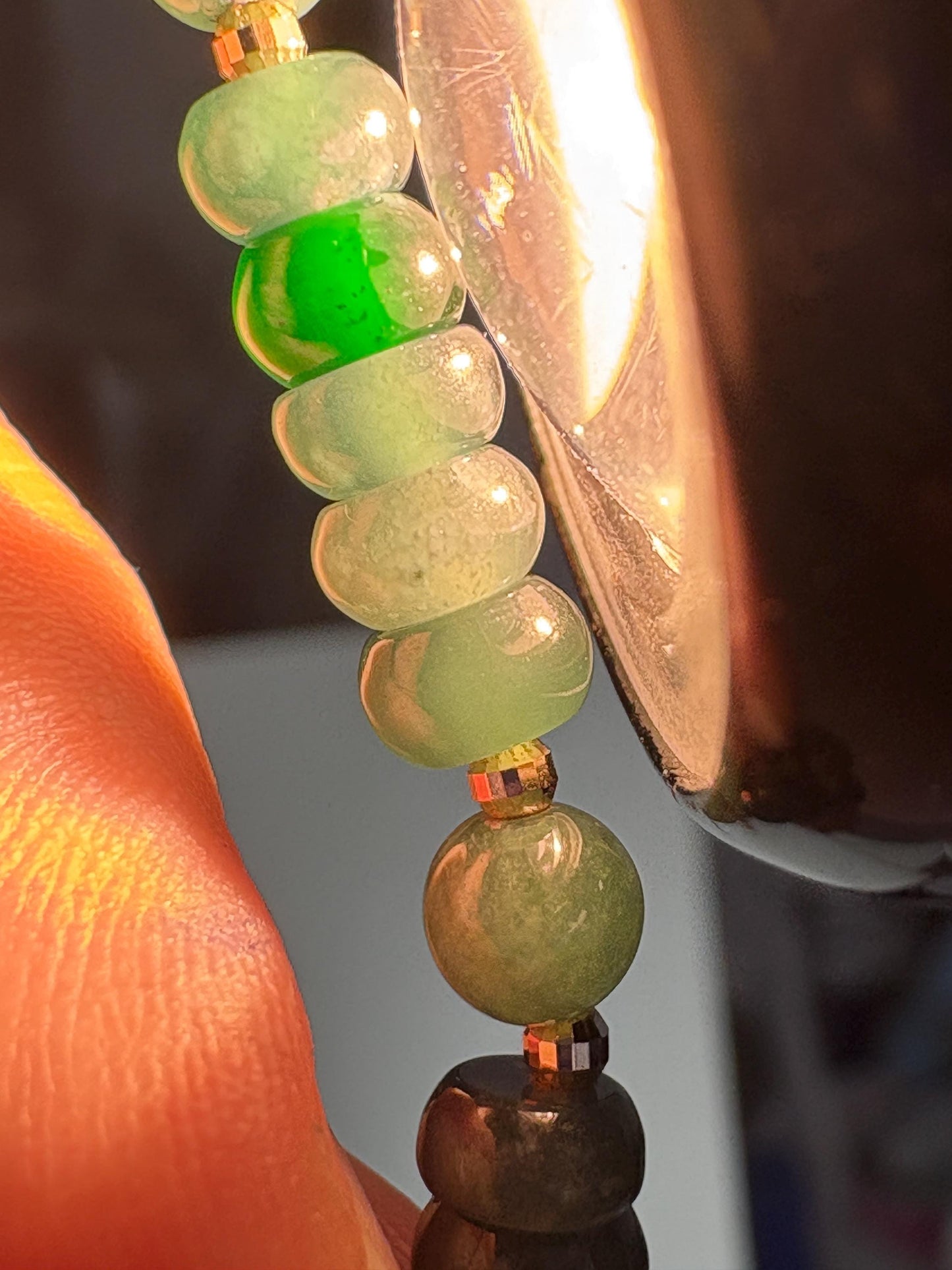 Natural untreated Type A jadeite jade stretch bracelet with solid 14k gold beads.