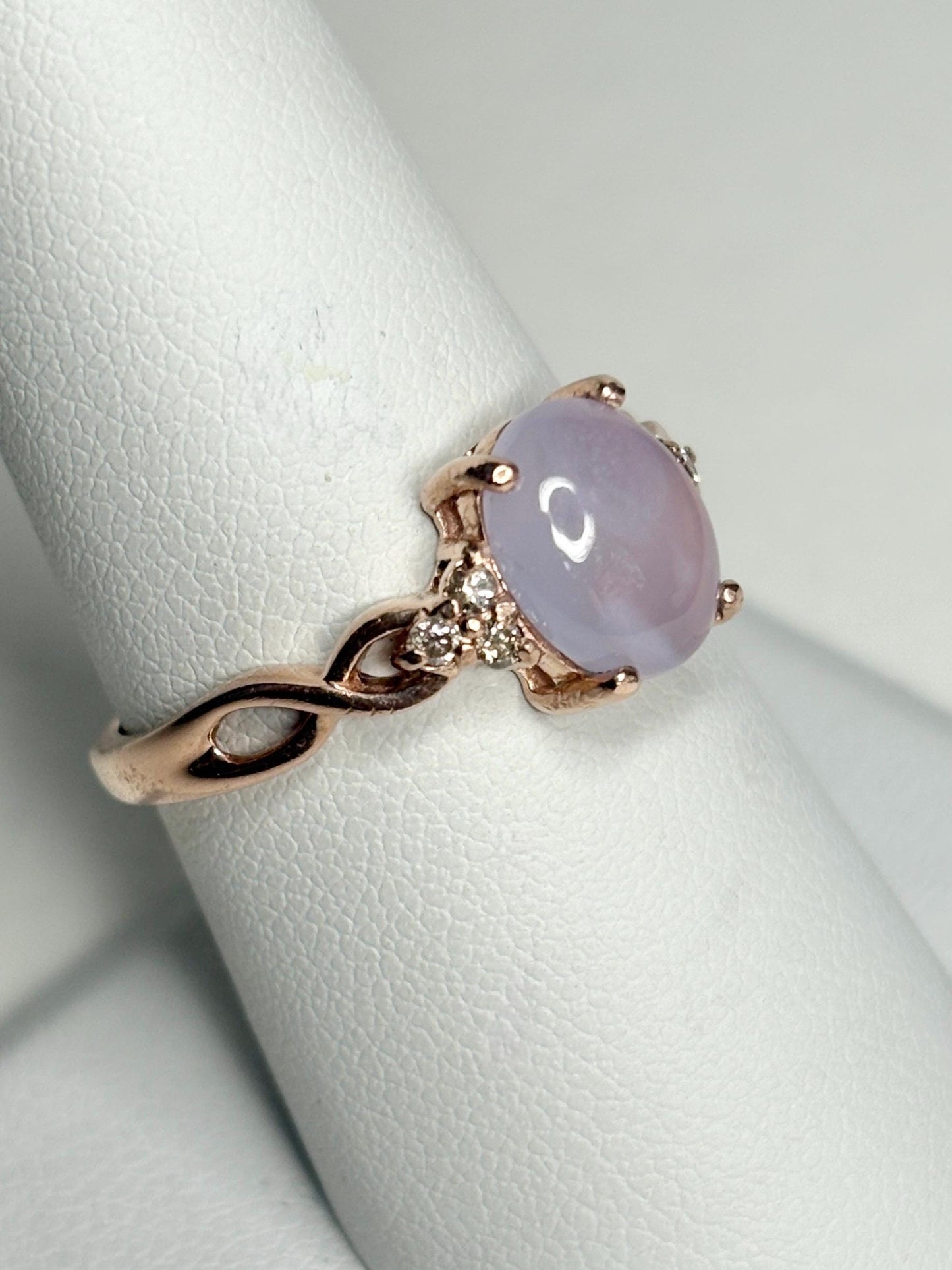 Rose gold ring with oval Holley Blue Oregon chalcedony and diamonds.