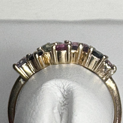 A 10k gold ring with multiple colored sapphires.