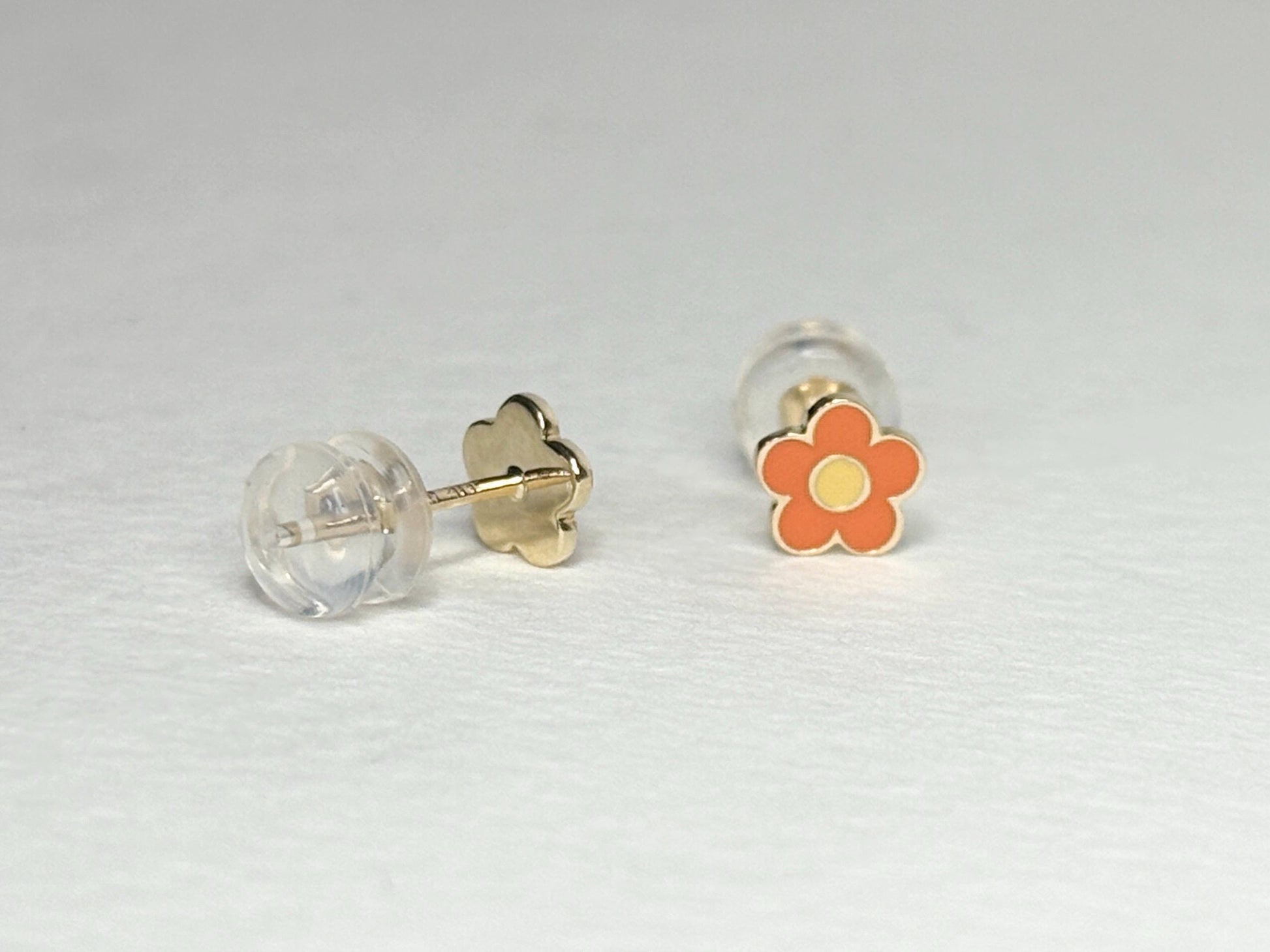 Adorable orange and yellow enamel daisy flower stud earrings in solid 14k gold.