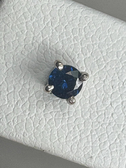 Natural dark blue sapphire stud earrings in solid 14k white gold.
