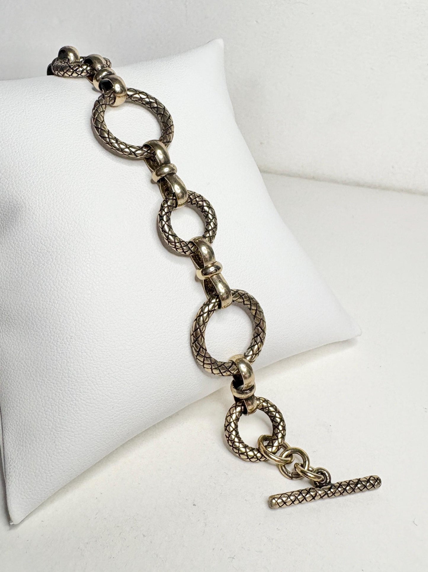 Vintage solid bronze adjustable link bracelet with toggle clasp.