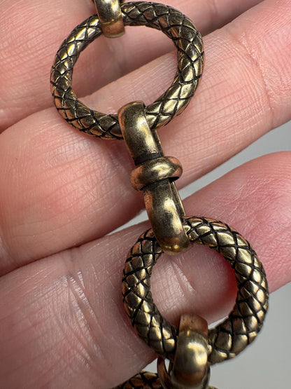 Vintage solid bronze adjustable link bracelet with toggle clasp.