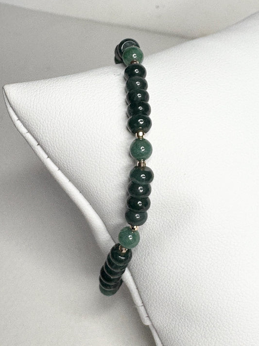Natural untreated Type A jadeite jade stretch bracelet with solid 14k gold beads.
