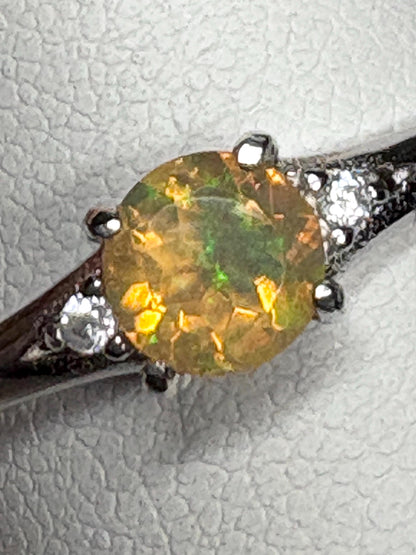 Ethiopian opal solitaire ring in sterling silver.