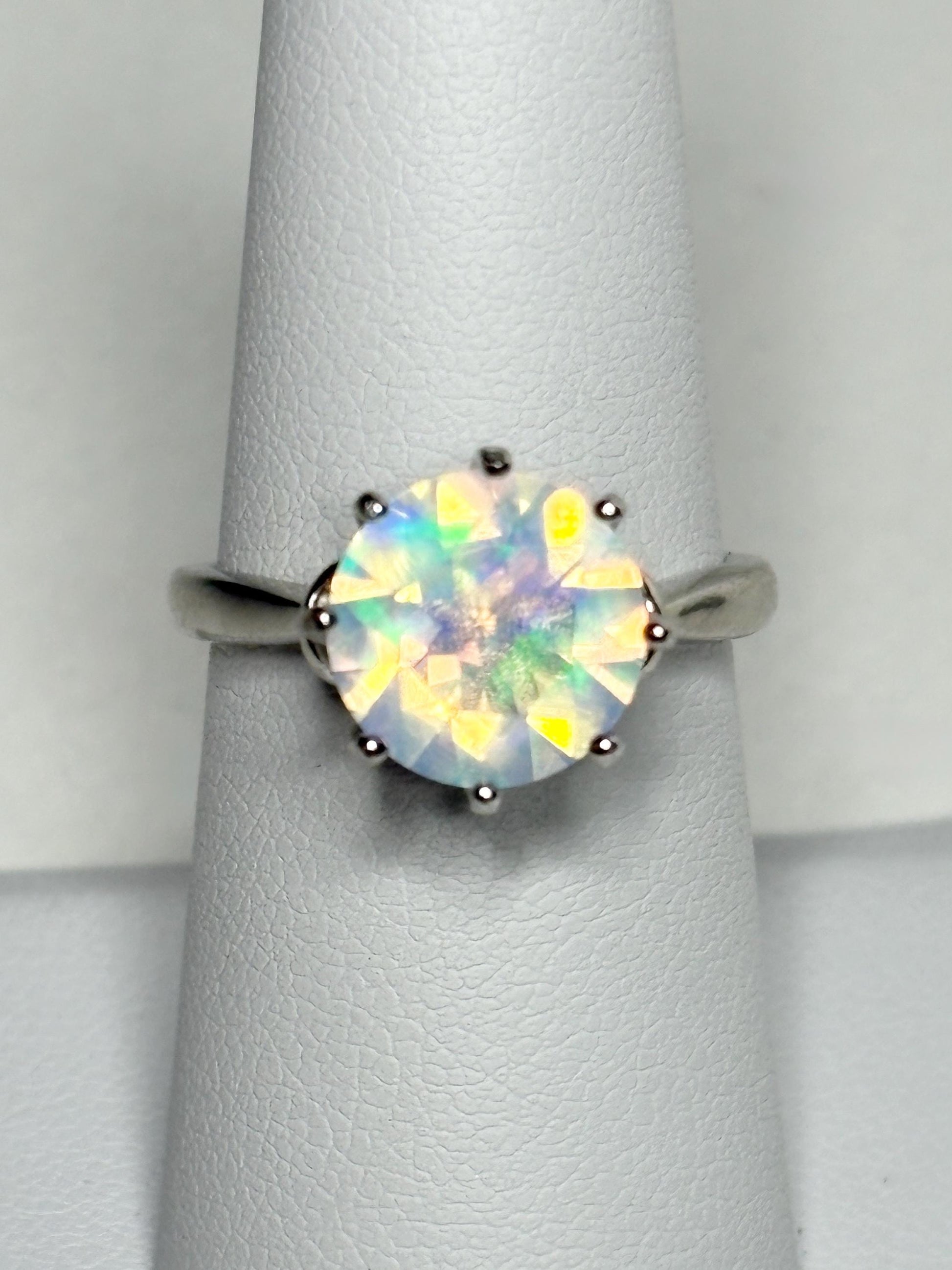 Sterling silver ring with a faceted Ethiopian crystal opal.