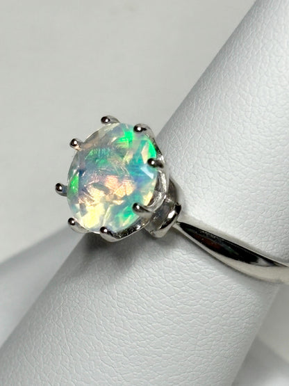 Sterling silver ring with a faceted Ethiopian crystal opal.